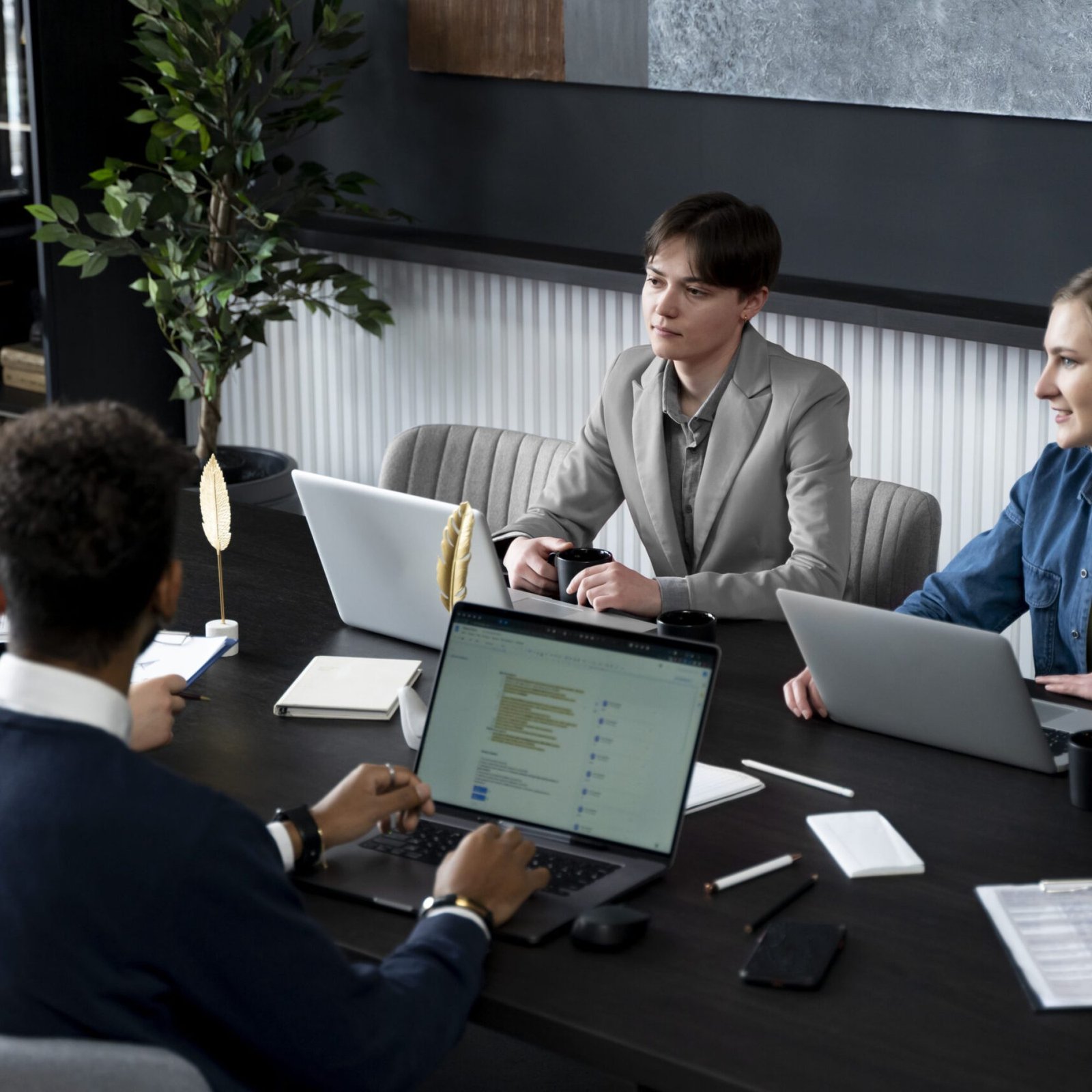 trans-person-working-office-with-colleagues